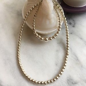 Sterling silver necklace and bracelet set.